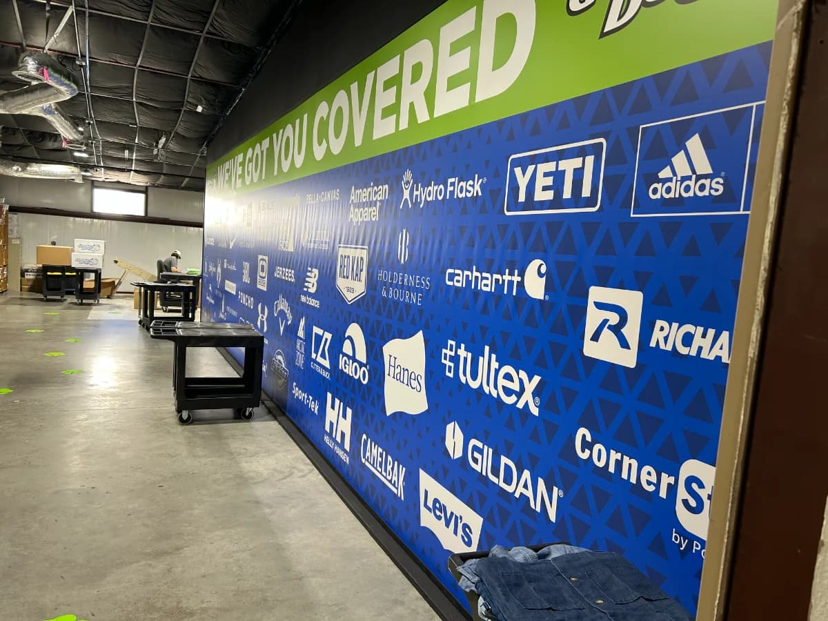 Full-wall printed brand graphic, We've Got You Covered